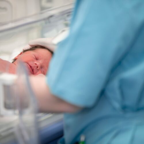 Image of Nurse Caring for New Born Baby